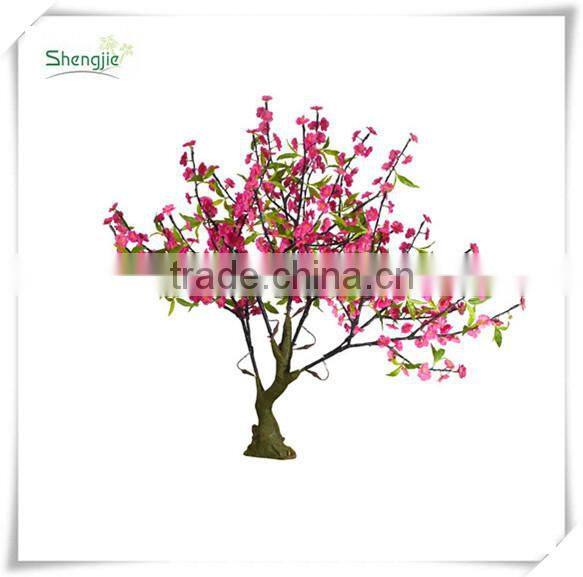 Outdoor artificial trees with lights