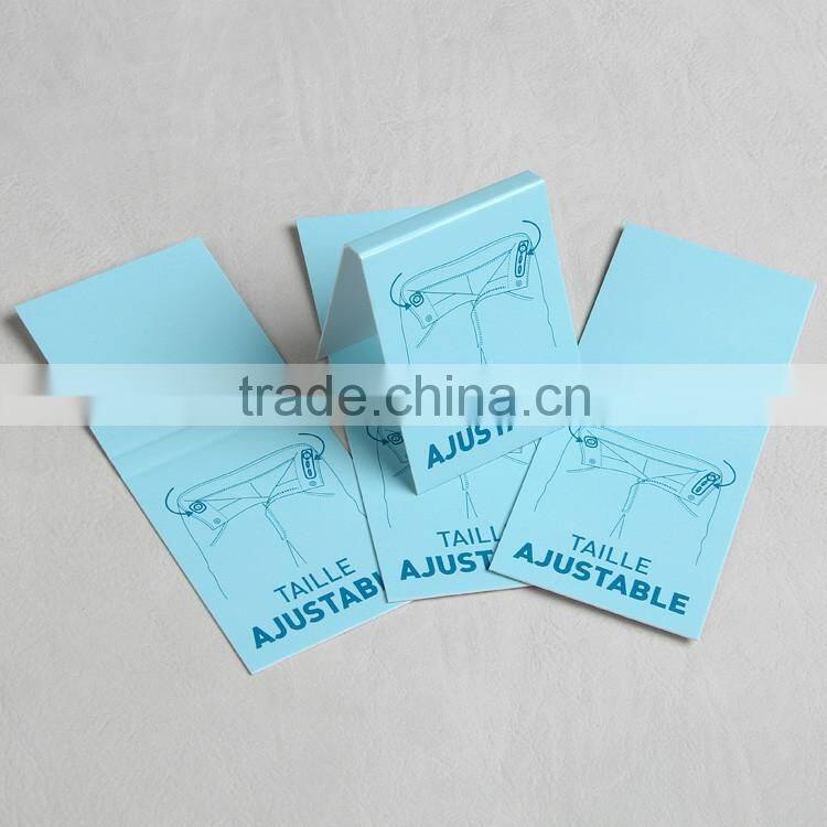 Blue folded paper hangtag for trousers
