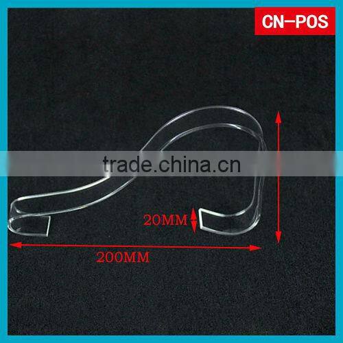 transparent acrylic shoes displayed standing