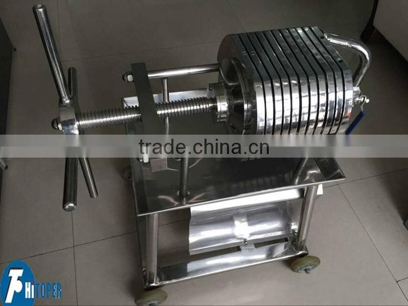 Fine membrane filter press for filtering used oil