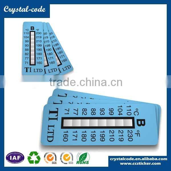 Reversible temperature sensitive color changing sticker, heat indicator sticker