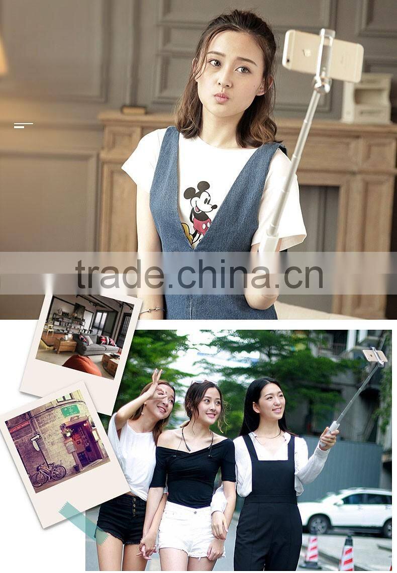 2016 New Wholesale mini automated selfie stick lip gloss selfie stick with cable for iphone and Android Smart phone