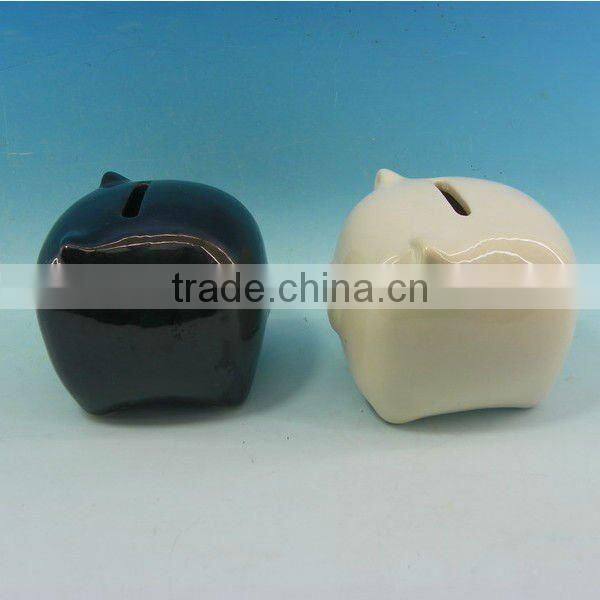 White and black ceramic piggy bank