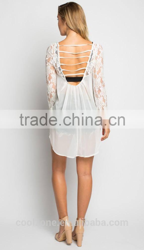 Beautiful lace front long sleeve lower back lace blouse