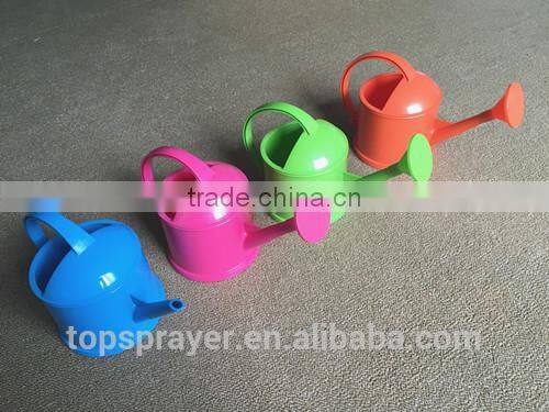 yellow green blue beautiful mini watering can