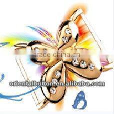 The metal butterfly shape shiny gold buckle