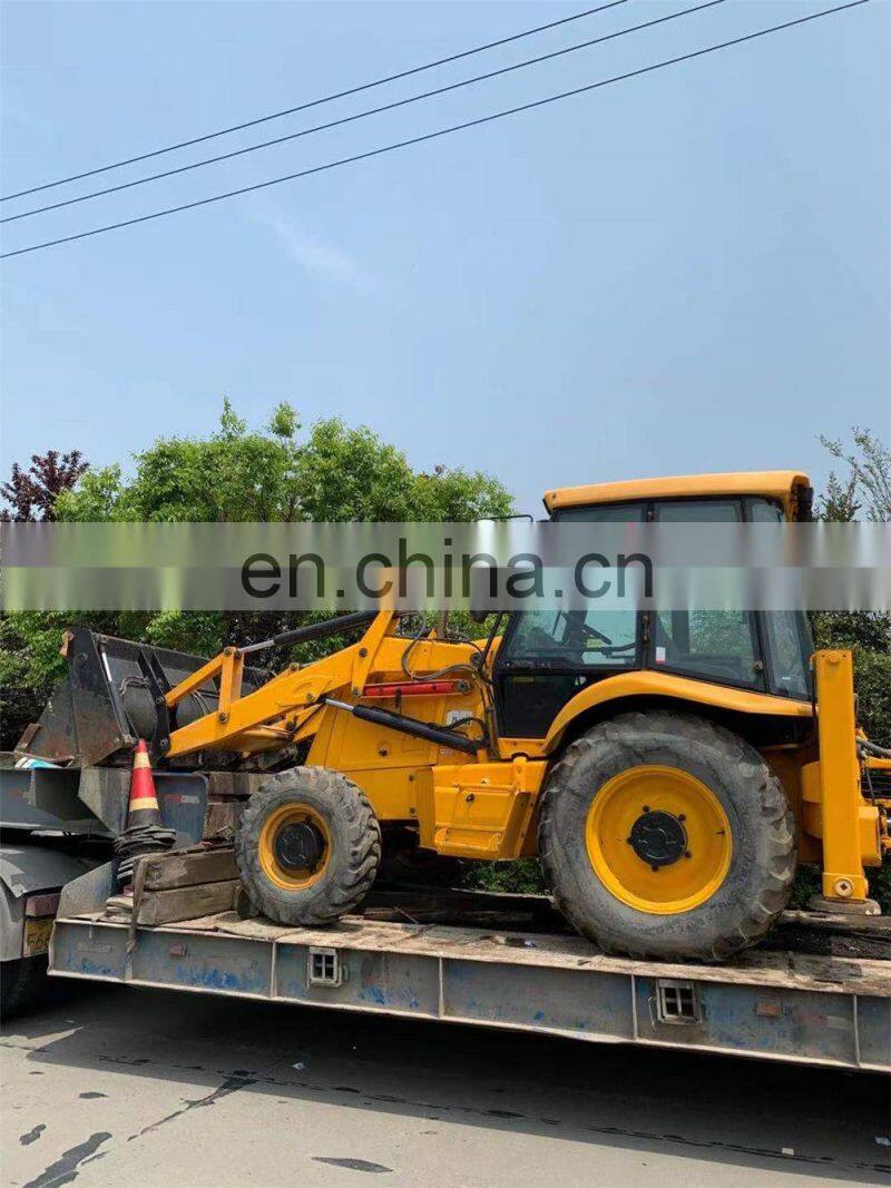 UK JCB 3CX backhoe loader loading, Jcb 3cx ship to Chile, Loading service for JCB backhoe loader transfer by flat