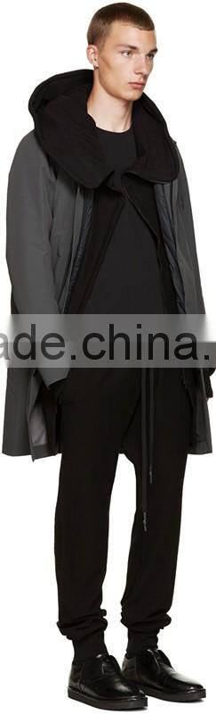 Long sleeve hoodie Structural wire at hood perimeter Asymmetrical zip closure Welt side pockets Rib knit cuffs and hem