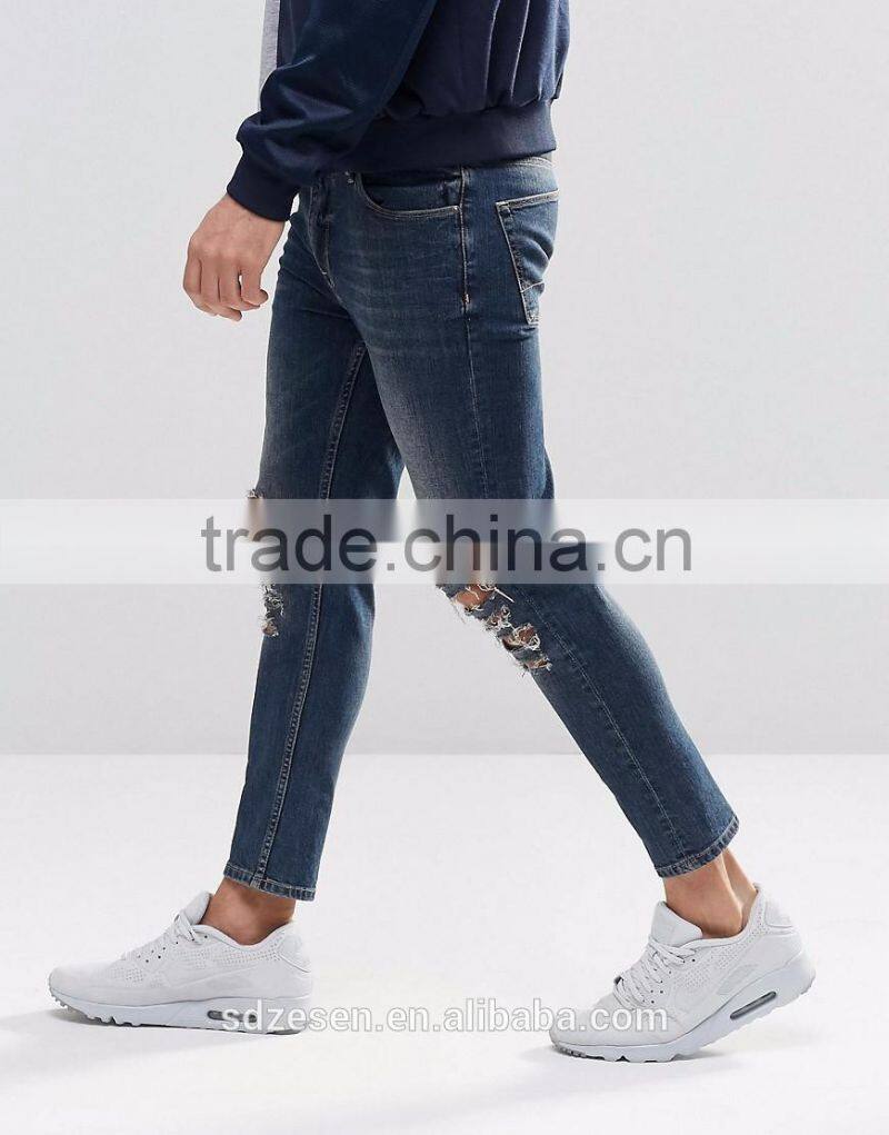 Men Custom Apparel Skinny Cropped Jeans Ripped Denim Pants With Extreme Rips In Blue Wash