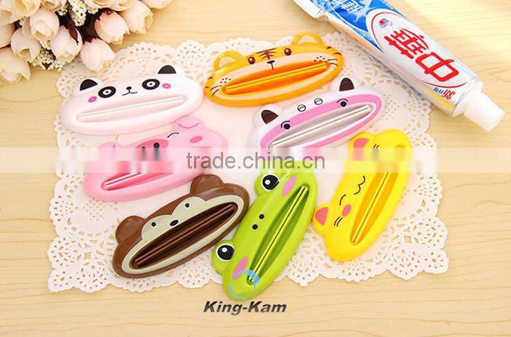 hot selling plastic toothpaste tube squeezer/toothpaste dispenser,wholesale custom children automatic toothpaste dispenser