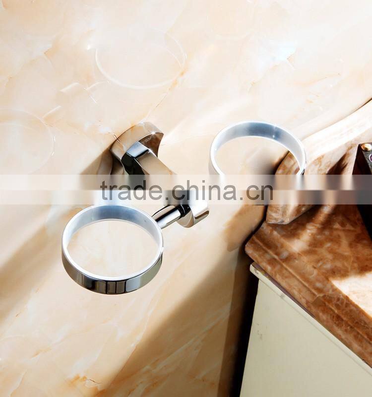 bathroom accessory with brass double cup holder for hotel family use.