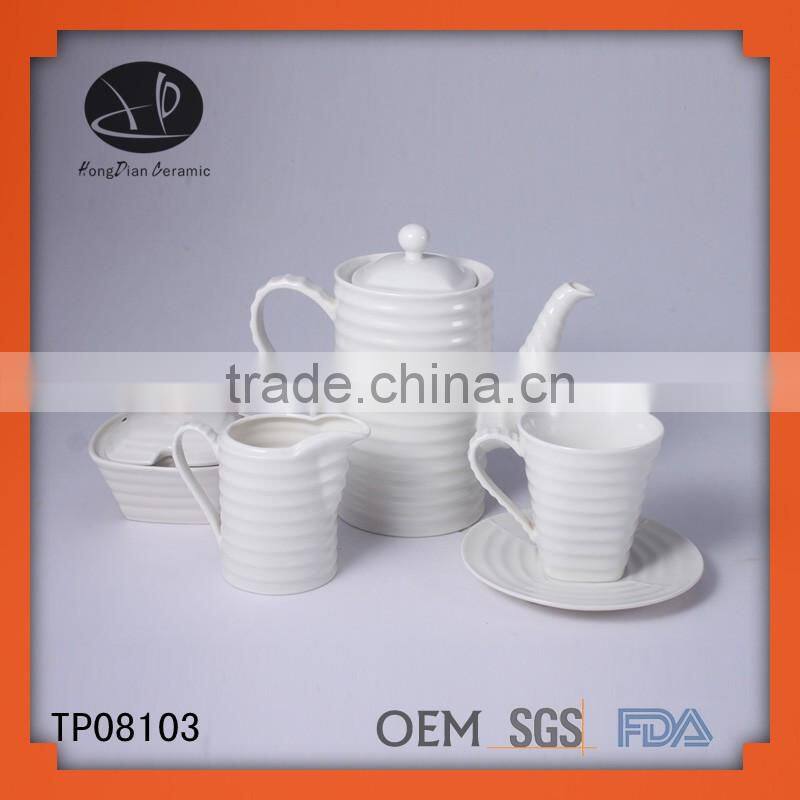 white ceramic coffee pot
