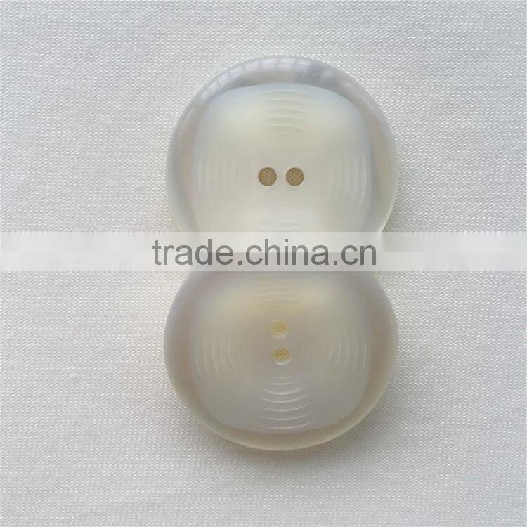 Wholesalers white plastic round handicraft wholesale button