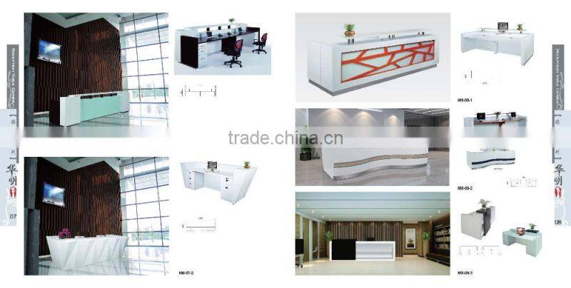 Black tufted reception desk made with tempered glass