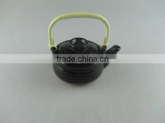 black-glazed ceramic mini teapot with plastic handle
