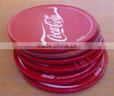 round tin coaster with pine board