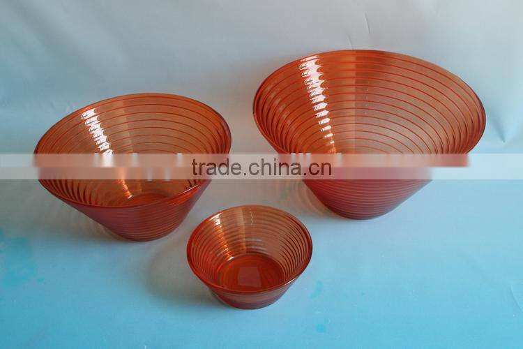 orange colored deep glass dinner bowl