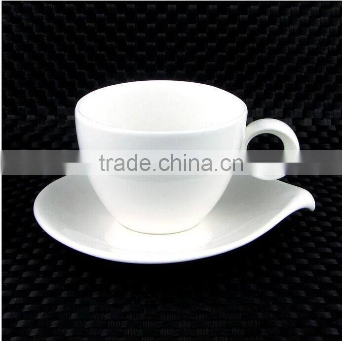 white porcelain cappuccino coffee cup and saucer
