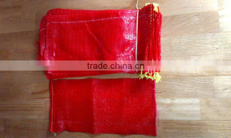 Tubular mesh bag with drawstring for packing vegetables