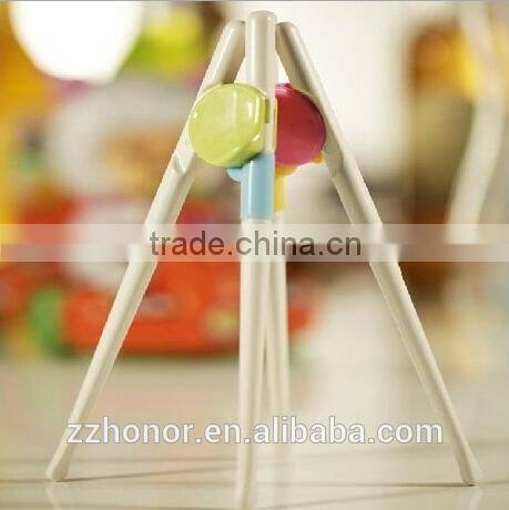 Children Learning Chopsticks, training chostick