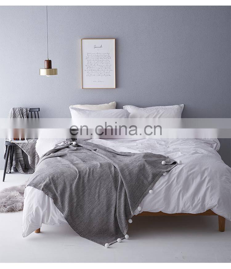 RAWHOUSE new design gray 100% cotton throw knitted pom pom blanket in stock