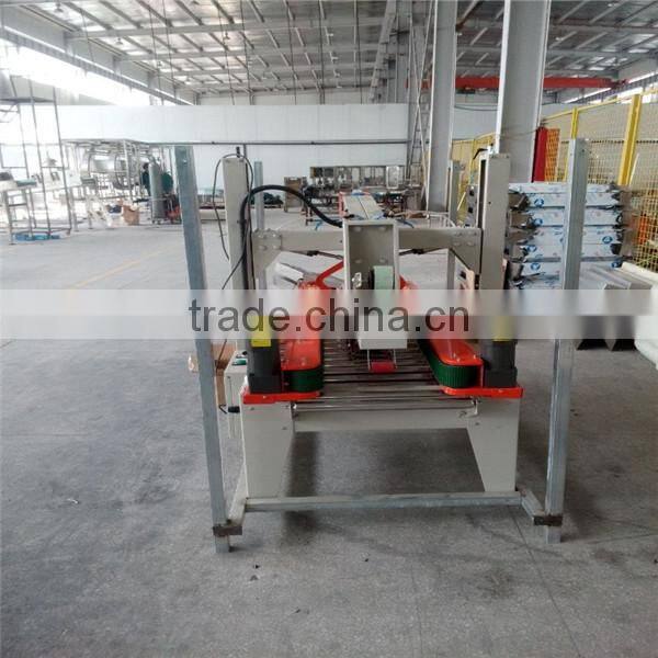 Automatic box sealing machine, automatic carton box sealing machine, carton box packing machine