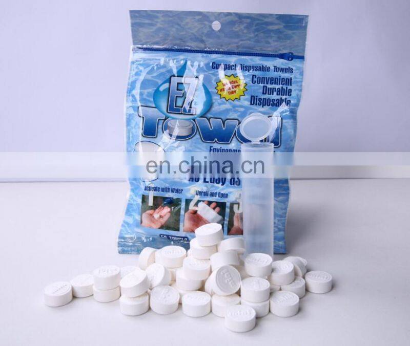 Eco friendly100% rayon material OEM compressed tissue/magic coin hotel napkins/paper roll compressed tablet wipe