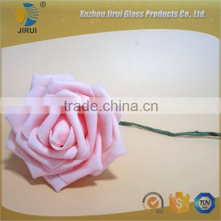 Rose sola flower with reed