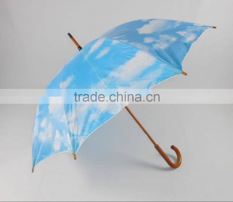 sky blue and white cloud umbrella wooden umbrella blue sky