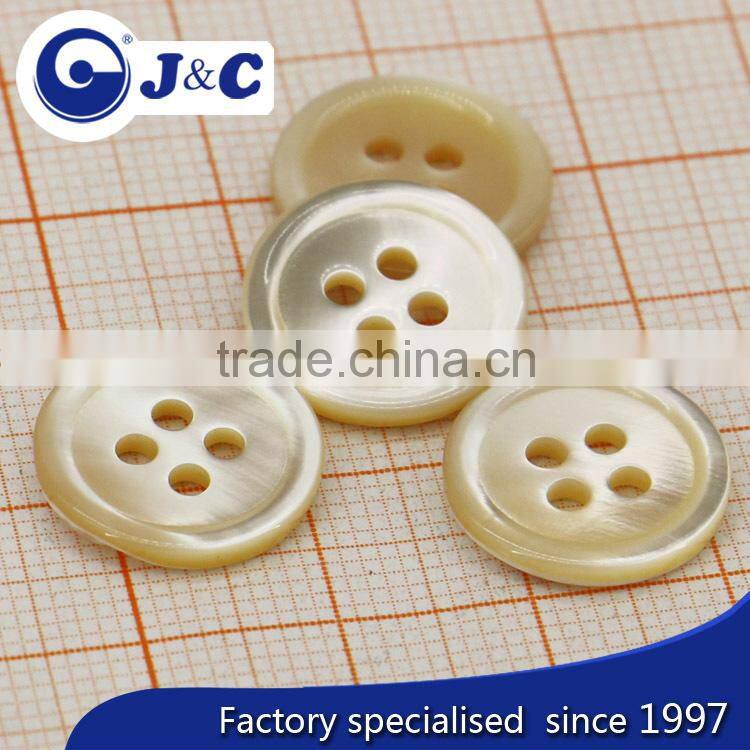cream coloureed trocas shell button