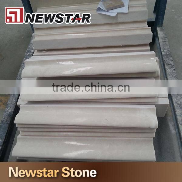 Polished white marble chair rail, marble mouldings, marble trim