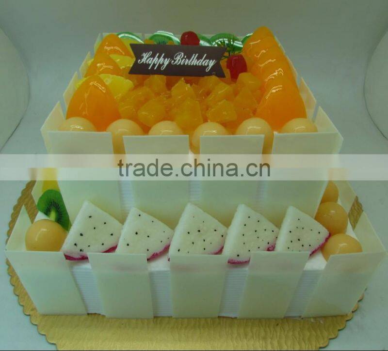 Artificial wedding/anniversary/birthday cake with fake fruits decoration
