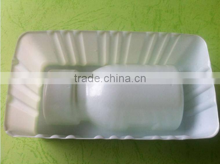 white disposable medical plastic trays, bottle trays