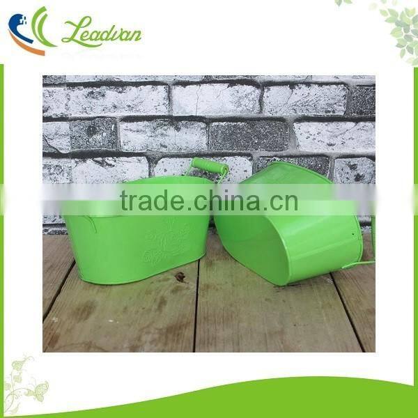 Green bowl shaped embossed metal garden flower pots and planters