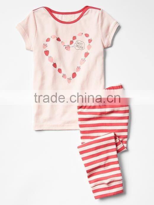 Girls short sleeved pajama set with polka dots
