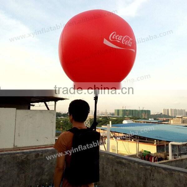 Color changed inflatable backpack balloon with removable banner