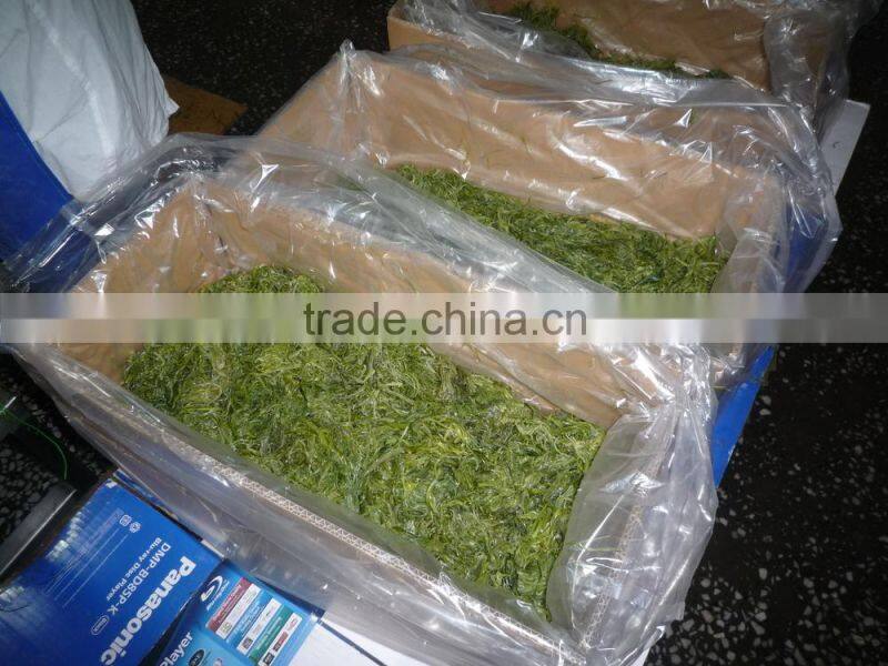 Frozen wakame stem cut salted