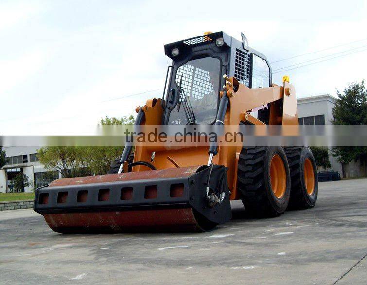 Vibratory roller for skid steer loader