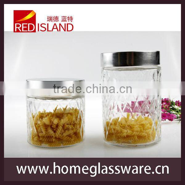 glass food and candy storage jar with carving pattern