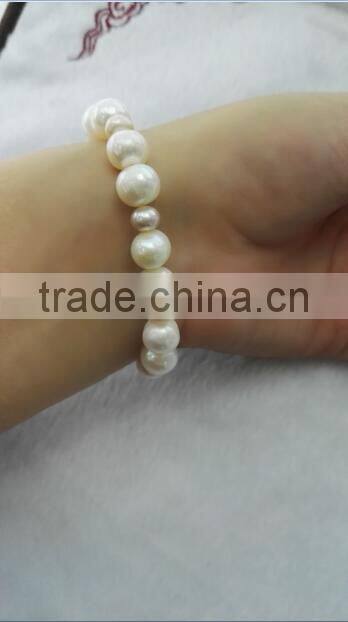 hot selling 3-4mm pink and 7-8mm white freshwater pearl bracelet