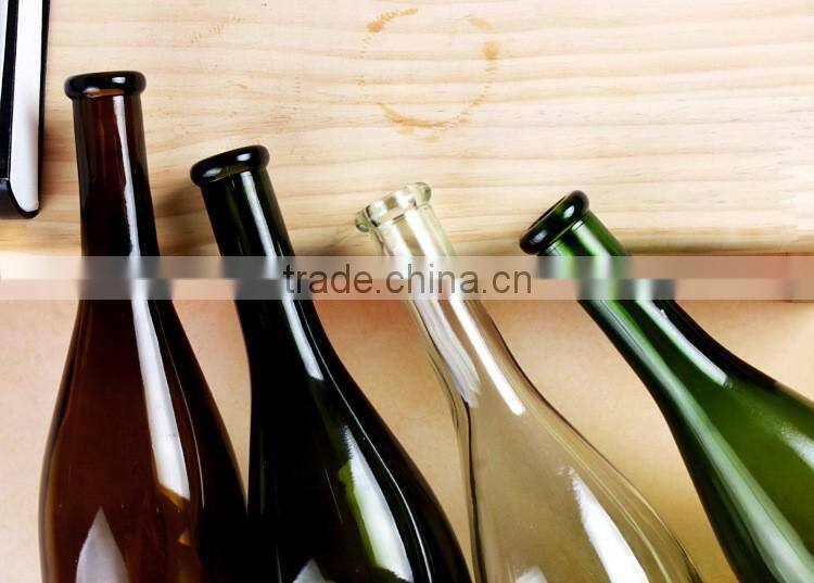 Hot selling 700ml Clear Amber Green Dark-Green Colored Glass Wine Bottles Empty Glass Bottles With Cork For Beverage