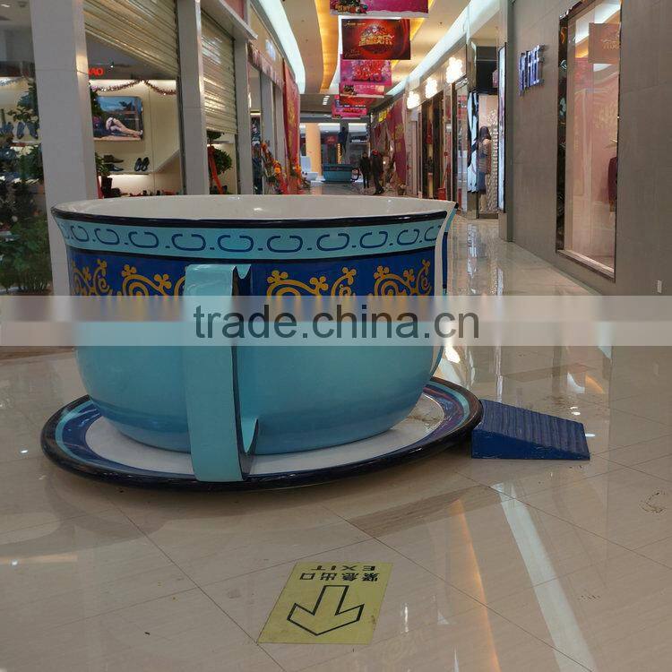 Large fiberglass coffee cup chair