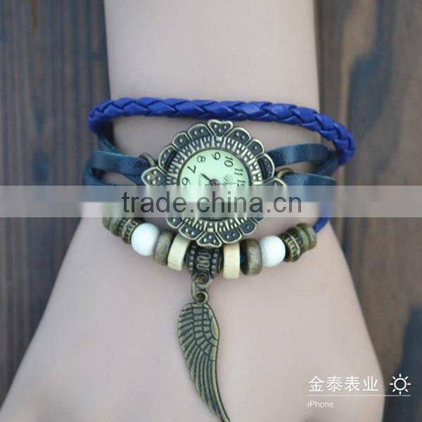 bulk buy from china Quartz watch F-05 for girls with Wing pendant,leather strap, bronzed watch case