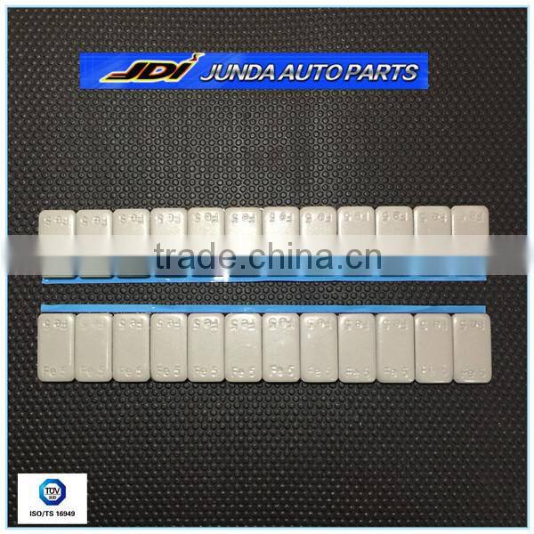 Steel stick on wheel balance weights in roll