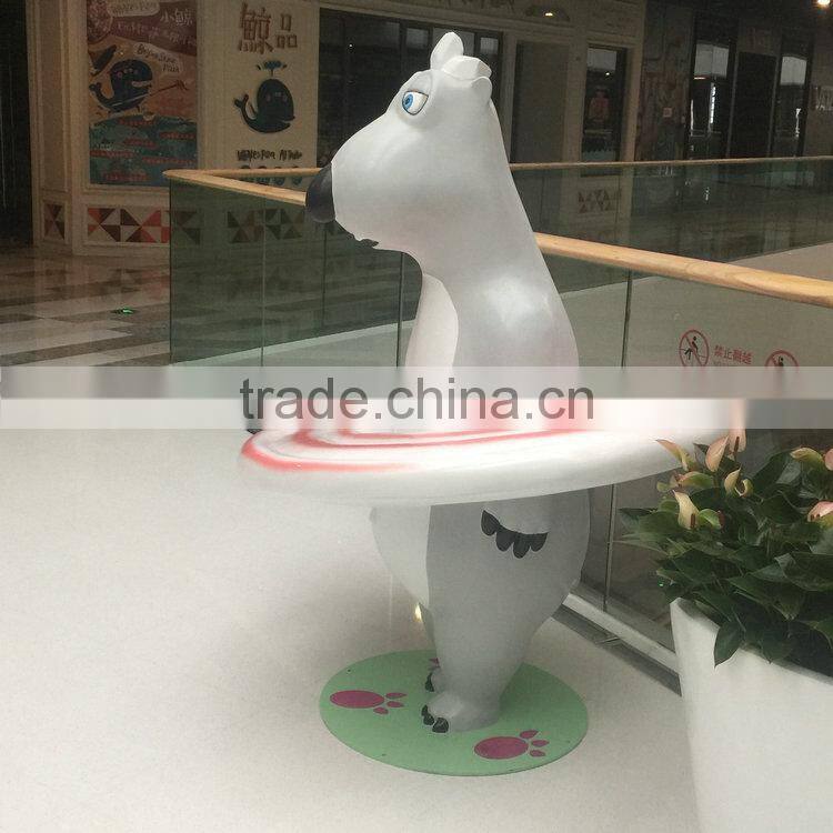Fiberglass bear statue with lollipop