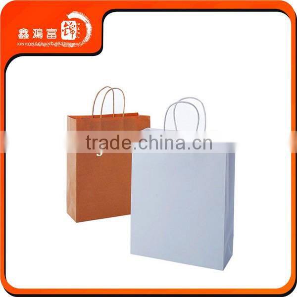 2016 XHFJ popular garment shopping paper bag design in craft paper