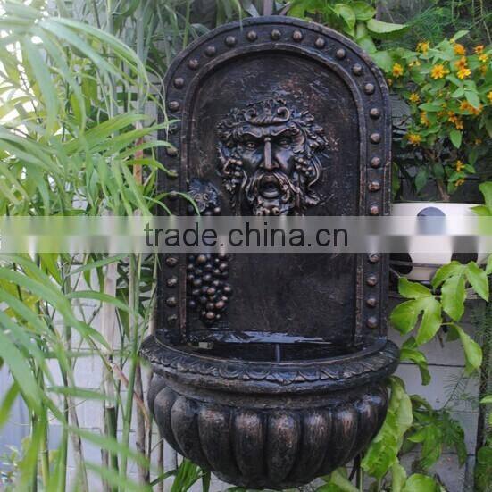 Garden old man human face wall water fountain