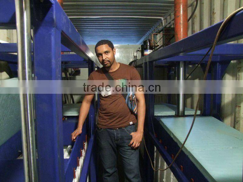 Electric containerized block ice maker for African areas