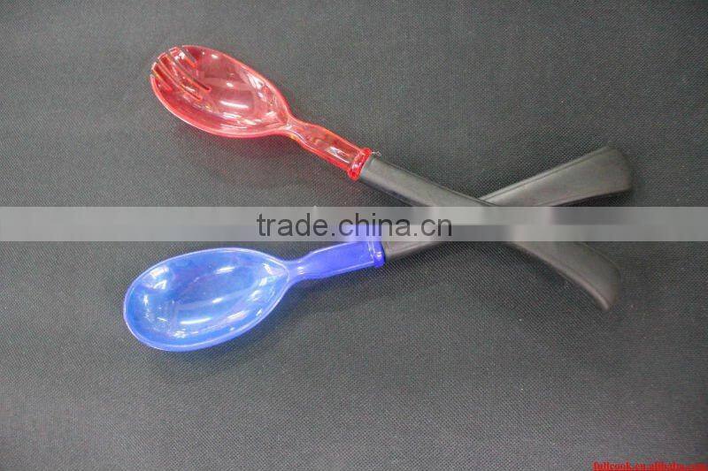 Colorful plastic salad spoon and fork set