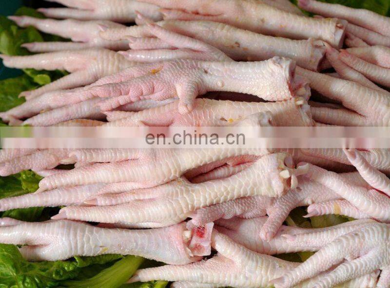 Stainless steel chicken feet cutter / chicken feet cutter price / automatic chicken feet cutting machine with working table